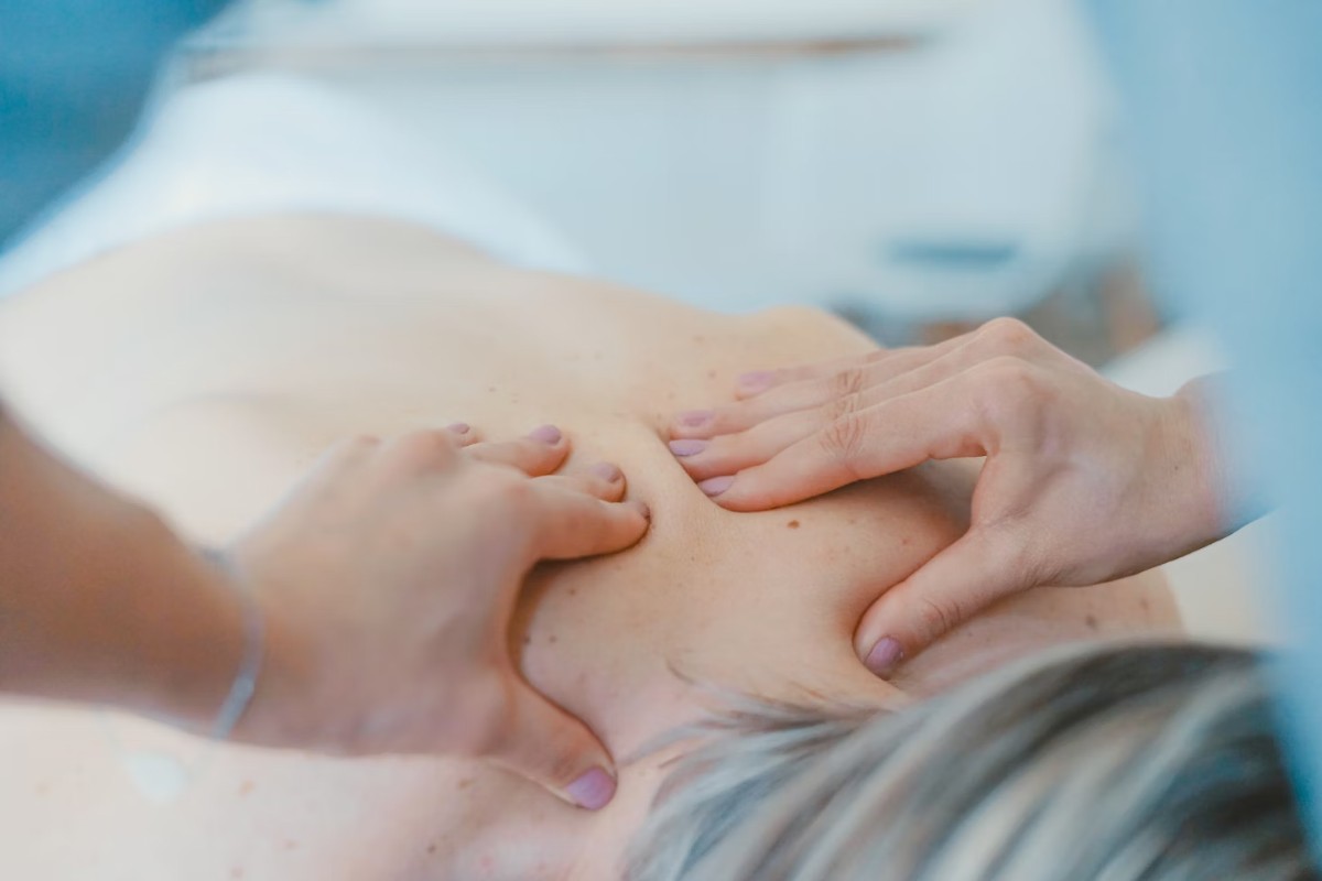 Woman receiving shiatsu massage