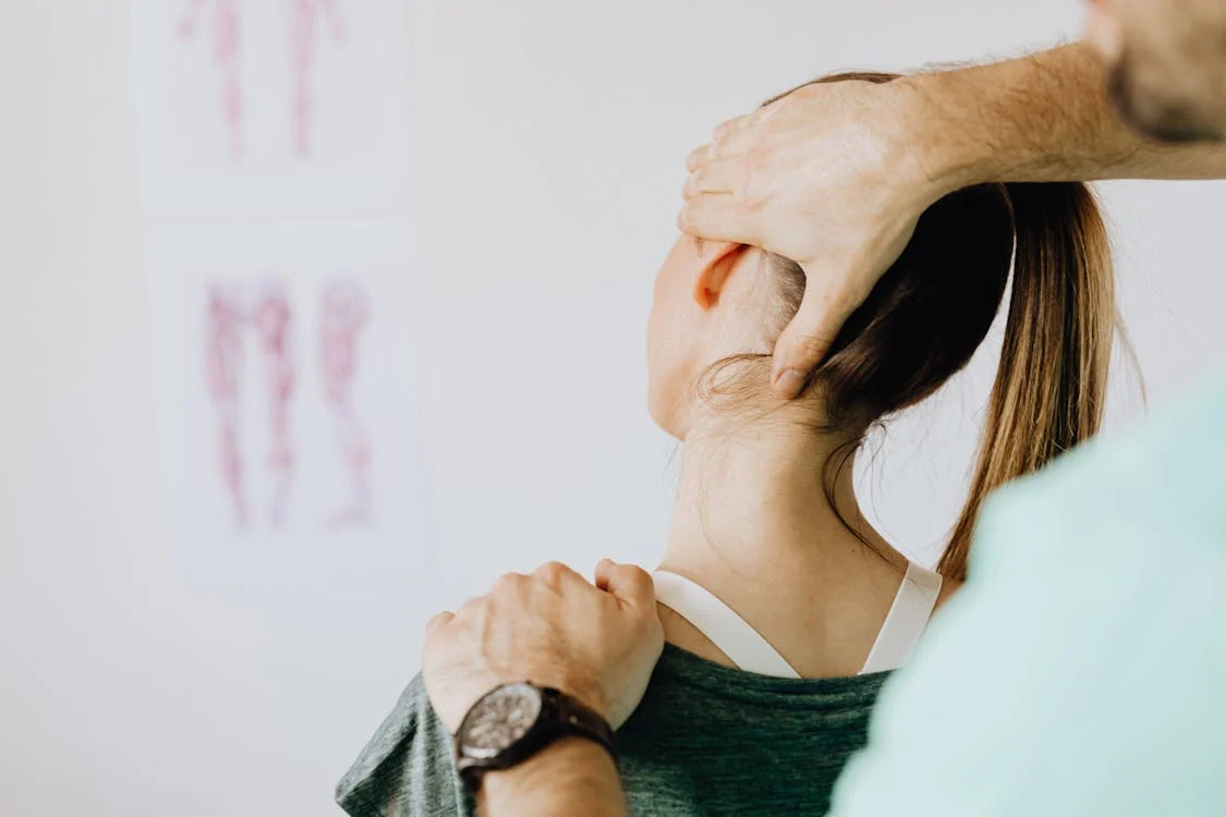 A woman being massaged by a professional therapist!