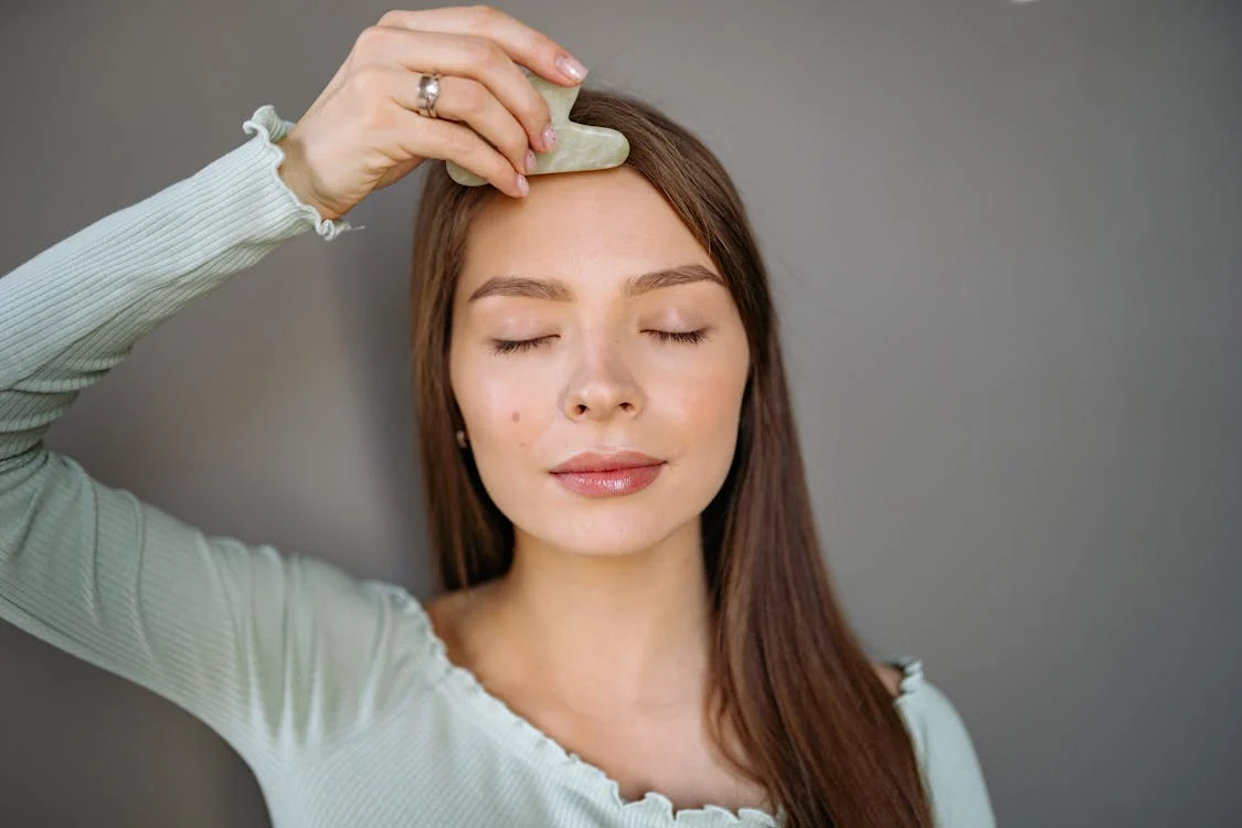 Woman doing a facial massage!