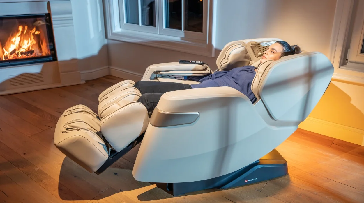 Women relaxes while using a Komoder massage chair