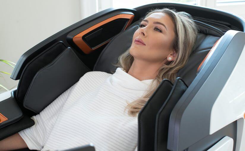 Office woman relaxing in massage chair