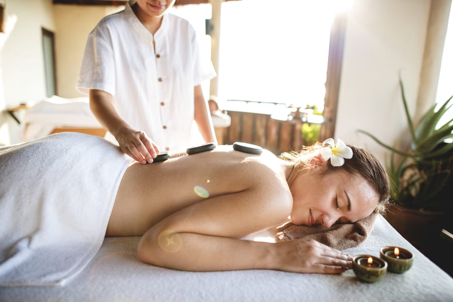 Woman getting a hot stone massage!